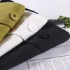 Foto real do novo tecido twill 2026, colete casual assimétrico em camadas para mulheres, peça de sobreposição versátil