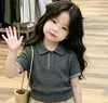 Conjunto Estilo Coreano Retrô Estilo Academia 26 Verão Novo Top de Tricô Cinza com Gola Polo Manga Curta Shorts Casuais Infantis