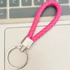 Llavero de cuerda de cuero trenzado simple creativo colgante de muñeca linda accesorios de llave para parejas tendencia regalos pequeños venta al por mayor