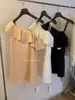Vestido de tirantes sin mangas de algodón y lino blanco francés para mujer Verano 2026 Nuevo estilo Diseño con volantes Hombros descubiertos Falda corta