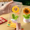 Planta de Girassol em Vaso de Fio de Tricô Acabado Transfronteiriço, Flor Artificial, Presente para o Festival do Barco-Dragão, Temporada de Formatura do Ensino Médio e da Faculdade