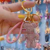 Net vermelho diamante violento urso carro controle remoto corrente anel cordão chaveiro pingente personalidade casal saco pendurado atacado