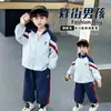 Conjunto Deportivo de Primavera y Otoño para Niños con Cuello Alto 2026 Nueva Marca de Moda Atractiva Bloque de Color Fresco Conjunto de Dos Piezas