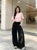 Pantalones casuales de retazos con flecos únicos para hombre, nuevos pantalones deportivos estampados de moda otoño estilo callejero de ajuste relajado y curvos para mujer