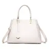 Bolso de mano transfronterizo modelo nuevo 2026, bolso de mano de gran capacidad, elegante bolso para mamá de mediana edad, se puede llevar cruzado o al hombro, venta al por mayor