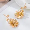 Pendientes de Borla y Flor de Moda de Nicho de Alta Gama de Venta Caliente Transfronteriza Adecuados para que las Mujeres los Usen en Reuniones Diarias, Exudando Elegancia