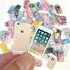 # Teléfonos Móviles Juguete Ultra-Mini Pequeños Artículos Pequeños Versión Miniatura de Celebridad de Internet de Gadgets Modelo de Juguete de Comida Metal