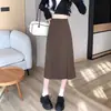 Falda larga de verano para mujer negra 2026 primavera y otoño nuevo estilo adelgazante de cintura alta con abertura falda corta de línea A
