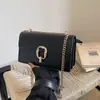 Bolso de mujer nuevo, simple y elegante, versión coreana, bolso cuadrado pequeño versátil único y moderno, bolso de hombro cruzado retro para mujer