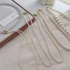 Collar de perlas redondas con hebilla magnética blanca Shijia Ao para mujer, cadena de lana apilada, elegante y ligera, 2024