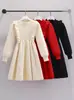 Otoño e invierno nueva moda color liso estilo casual vestido niñas estilo western manga larga vestido suéter tejido