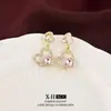 Pendientes de plata con forma de aguja y diseño de corazón con incrustaciones de diamantes, exquisitos y elegantes, versátiles para el día a día, pendientes de lujo ligero y a la moda.