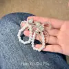 Pendientes de perla con lazo, frescos y elegantes, aretes versátiles de estilo hada para mujer, accesorios de joyería para orejas de estilo nicho japonés coreano, venta al por mayor