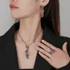 2025 Nueva Joyería Zhuangshengsheng Base de Cobre Chapado en Oro Corindón Rojo Simulado Diseño Oro Negro Juego Venta al por Mayor