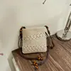 2026 Verão Novas Bolsas Casuais Simples de Nicho Tecidas Estilo Férias Moda Versátil Bolsas de Ombro Transversais