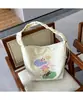 Bolsa de lona de liquidação Bolsa de ombro feminina Bolsa de outono e inverno Bolsa de grande capacidade Bolsa escolar de estudante Bolsa de pano Bolsa de compras