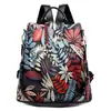 Comércio exterior mochila moda quente feminina 2024 moda coreana versátil tecido Oxford mochila antifurto bolsa feminina com pingente