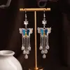 [Selección Premium] Nuevos Pendientes Largos con Borlas Étnicas Miao, Pendientes de Moda Estilo Étnico de Plata Miao de Lujo Ligero