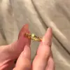 Explosiones del Libro Rojo Anillo de Diamante Amarillo de Gran Altura 2025 Nuevo Oro Antiguo Transferencia Nudo de Bambú Taladro Anillo Simple
