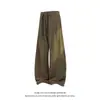 Pantalones casuales de estilo americano de corte ceñido con estampado de escamas de dragón para hombre, pantalones curvos de cordón deconstruidos, pantalones largos holgados y fluidos de otoño 2026