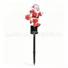 Nuevas luces solares de Navidad para decoración de ambiente, luces de suelo brillantes de Papá Noel, luces para césped de patio exterior