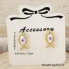 Venta caliente transfronteriza pendientes pequeños y exquisitos de ojo de diablo personalidad retro francesa nicho creativo pendientes de hip-hop joyería
