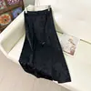 Nova saia feminina de comprimento médio estilo chinês para o verão de 2026, emagrecedora, com fenda, saia evasê de jacquard, saia justa