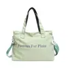 Bolso tote de gran capacidad de alta gama para mujer para otoño e invierno, nuevo modelo 2026, bolso de hombro de color liso con letras
