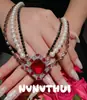 Collar multicapa con gema de perla y diamante rojo de paloma austriaca, chapado en oro de 18 quilates, diseño de gargantilla de circonita antigua.