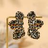 Europa e Estados Unidos transfronteiriços metal tridimensional flor brincos sexy temperamento arco leopardo brincos de forma irregular