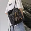 Nueva mochila escolar moderna y genial transfronteriza estilo retro europeo y americano mochila de PU para hombres y mujeres mismo estilo mochila casual de gran capacidad