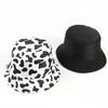 Venta caliente transfronteriza sombrero de pescador de panda de dibujos animados femenino coreano ocio vaca doble cara de ala plana sombrero para el sol al por mayor