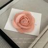 Broche pequeño de flor de camelia Xiangfeng para mujer, estilo retro de alta calidad, tridimensional, accesorio para abrigo, 2025