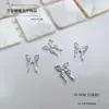 Celebridad de internet aleación de plata mariposa joyería para uñas estilo lujo ligero metal avanzado accesorios de decoración de uñas tridimensionales al por mayor