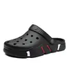 Zapatos con agujeros sandalias pantuflas de hombre talla grande pantuflas para exteriores pantuflas de viaje de ocio al aire libre de doble uso zapatos de playa venta al por mayor