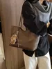 Bolso Tote Vintage para Mujer 2026 Nuevo Modelo Nicho Versátil Moderno Gran Capacidad Bolso de Hombro Bolso de Mano Simple para Viajes