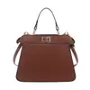 2026 Nuevo Modelo Transfronterizo Nicho Elegante Versátil Doble Cara Cerradura Bolso de Mano Bolso Cruzado Cadena Bolso para Labial Bolso de Alta Calidad para el Trabajo