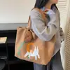 Versão Coreana da Bolsa de Lona Ins Gato Fofo de Grande Capacidade para Mulheres 2026 Novo Modelo Bolsa de Ombro Casual para Estudantes, Sala de Aula, Deslocamento