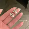 Pendientes de aguja de plata S925 con circonitas brillantes y exquisitas para mujer, ligeros, lujosos y elegantes, de alta gama, populares entre las celebridades de Internet, que combinan con todo.