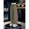 Nuevos pantalones casuales de otoño e invierno para hombre con cordón, color liso, talla grande, pantalones curvos de corte inclinado estilo americano, pantalones deportivos rectos para hombre
