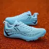 Nuevo modelo de otoño de zapatillas de clavos juveniles para atletismo, sprint, entrenamiento de examen físico, carrera y salto de longitud para hombres