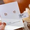 Pendientes de plata de ley S925 con incrustaciones de circonita hueca en forma de corazón de alta calidad, nuevos de 2023, con brillantes pendientes de botón que combinan con todo.