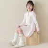 Nuevos estilos de otoño e invierno: calcetines largos engrosados con adorno de lazo para niñas, perfectos para Año Nuevo, proporcionando calor y actuando como calentadores de rodillas y piernas
