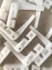 Máquina empaquetadora tipo almohada piezas tipo 08BL horquilla de nylon en forma de 7 bloque de alimentación desplazado bloque de descarga plato de alimentación