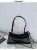 Bolso de hombro de piel genuina para mujer, nuevo modelo 2026, bolso cuadrado, moderno y versátil, diseño de nicho, estilo relajado, bolso de axila para mujer