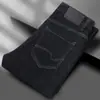 Pantalones vaqueros casuales de alta gama para primavera y otoño, de pierna recta, corte holgado, elásticos para hombre, nueva colección de otoño 2026, pantalones de longitud media para hombres de mediana edad