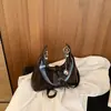 Elegante Bolsa Feminina de Axila 2026 Nova Moda Verão Tendência Retro Nicho para o Trabalho Ombro Transversal
