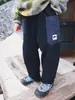 Calça de Trabalho Infantil Yuanbao 2026 Outono/Inverno Nova Calça Longa Solta Estilo Montanha Outdoor para Crianças Maiores