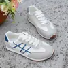 Zapatillas de entrenamiento alemanas para mujer 2026 primavera nuevo retro casual de suela plana deportivas versátiles punta redonda cómodas para estudiantes