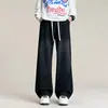 Jeans Americano Tendência Outono 2026 com Lavagem Desgastada, Cordão e Cintura Elástica para Homens, Caimento Solto, Calça Wide-Leg Versátil e na Moda